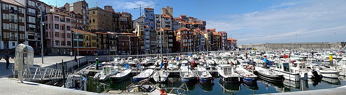 Harbour surrounded by buildings and filled with small boats