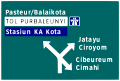 4-way intersection directional sign. TOL PURBALEUNYI, a motorway, is highlighted in white and bears the international highway symbol, while Stasiun KA Kota, a train station, is highlighted in blue.