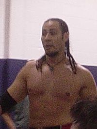 A picture of wrestler Julio Sanchez in the ring.