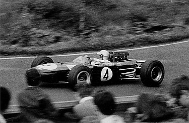 Jack Brabham driving a BT11-Climax. Brabham disliked them: "There's no way you could call those 1500-cc machines Formula One."