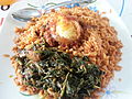 Image 34Jollof rice with vegetables and a boiled egg (from Malian cuisine)