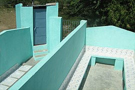 Outdoor urinals at school for boys (left) and girls (right) in Tamil Nadu, India