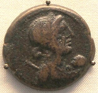 A coin with the image of Cleopatra VII and her son Caesarion as a baby.