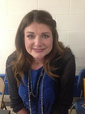 A woman with long brown hair