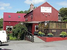 red metal-clad building