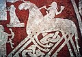 Détail sur l'image d'un cavalier chevauchant un cheval à huit jambes sur la pierre de Tjängvide