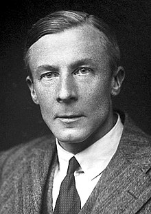 black and white portrait photograph of Edgar Adrian, wearing a shirt, tie and jacket