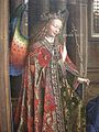 رئيس الملائكة جبريل مرتدياً غفارة مع مورس ضخم مرصع بالجواهر في عيد البشارة جان فان إيك، 1434-36.