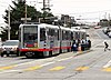 Passengers board a train at San Jose and Geneva, 2018