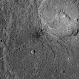 Detail of dark spot in Matisse crater. Hollows are present in the dark spot and in Ngu Facula in the unnamed crater in upper right.