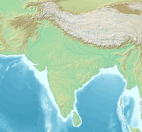 தௌலி is located in South Asia