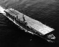 USS Wright underway at sea with North American T-6 Texans on board somewhere between the late 1940s and the early 1950s