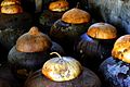 Traditional burnay jars containing fermenting bagoong in Ilocos Norte