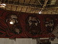 From left to right, mosaics of Friedrich Engels, Karl Marx and Vladimir Lenin