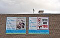 Advertisement in front of Houston Holocaust Museum announcing display of cartoons by Arthur Szyk and Dr. Seuss during World War II (pre-renovation building)