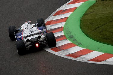 Nick Heidfeld driving through Eau Rouge at the 2008 Belgian Grand Prix for BMW Sauber