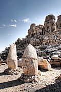 East terrace: Heads of Apollo-Mithra-Helios-Hermes and Heracles-Artagnes-Ares