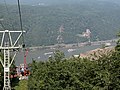 A chairlift in Assmannshausen, view to a Castle Rheinstein on the opposite bank of river Rheine.