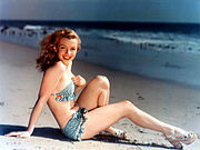 Marilyn Monroe posing for a postcard photograph c. 1940s