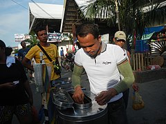 Sorbetero serving sorbetes in the Malolos Historic Town Center, Bulacan