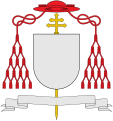 Galero gules com quinze borlas por lado, usado por cardeais no lugar de um elmo (e cruz patriarcal)