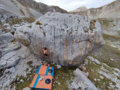 Climber using a bouldering mat (from Rock-climbing equipment)