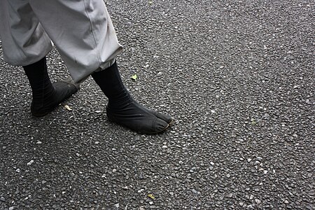 A construction worker wearing jika-tabi and tobi trousers, 2008