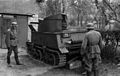 Image 24German soldiers examine an abandoned Belgian T13 Tank, 1940 (from History of Belgium)