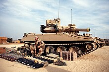 Soldier of 3rd Battalion, 73rd Armor laying out equipment for an M551A1 Sheridan before life fire exercise during Operation Desert Shield DA-ST-92-07502.jpg