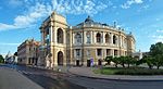 A round opera house built in the baroque style.