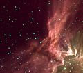 ’n Nabyskoot van ’n infrarooiwolk in die Spitzer-beeld.