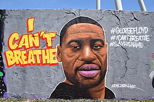 Граффити в честь Флойда на Берлинской стене, слева фраза «Я не могу дышать»