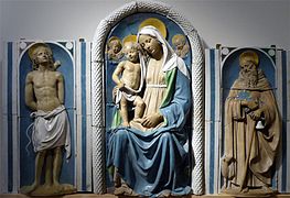 Madonna con Niño, San Sebastián y San Antonio Abad, de Andrea della Robbia (1500)