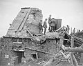 British officers in a captured German armoured observation post on a ruined house in St Eloi, 11 August 1917