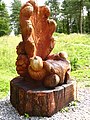 Carved seat above Compton Dundon