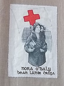 Fabric quilt panel with image of Nora O'Daly and text 'Bean láidir cróga' (strong, brave woman in Irish)