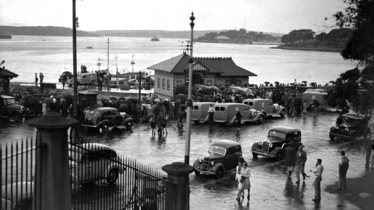 Ambulances wait at Man O' War Steps to transport survivors to Sydney and St. Vincent Hospitals