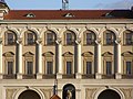 Černín Palace in Prague (1660s) has triglyphs and guttae as ornaments at the top of arches.