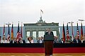 U.S. President Ronald Reagan, speaking before Brandenburg Gate on June 12, 1987, demands the Kremlin free Berlin and "Tear down this wall!"[44]