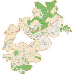 Mapa konturowa gminy wiejskiej Oleśnica, u góry po prawej znajduje się punkt z opisem „Pałac w Ostrowinie”