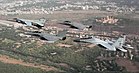 Eine MiG-27UPG und eine Su-30MKI der Indian Air Force und zwei Rafale der Französischen Luftstreitkräfte über dem Umaid-Bhavan-Palast in Jodhpur (Bild vom 6. Juni 2014) KW 26 (ab 24. Juni 2018)