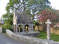 Fig. h7: St Cleer's holy well, with its stone cross