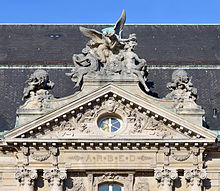 Example of a building tympanum by artist René Rozet, found on the ARBED building in Luxembourg City