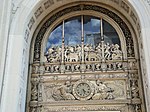 The bronze frieze over the main entrance.