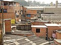 The roofs have in the meantime all been sealed, the houses have foundations and solid walls.