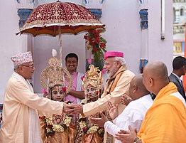 Prime Minister of India, Narendra Modi in a paag with the Prime Minister of Nepal, K.P. Sharma Oli in Dhaka topi in Janakpurdham, Nepal