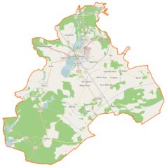 Mapa konturowa gminy Wolsztyn, blisko centrum u góry znajduje się punkt z opisem „Wolsztyn”