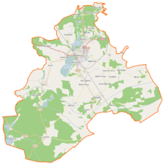 Mapa konturowa gminy Wolsztyn, blisko centrum u góry znajduje się punkt z opisem „Muzeum Regionalne w Wolsztynie”