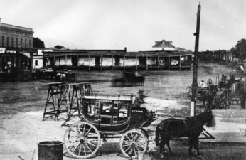 Broad Place at north end of Los Angeles Street c.1870s. At back, Coronel Adobe (l), Calle de los Negros (r)