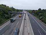 View toward Iparos Street Interchange (Exit 18) from Szövő Street Road Bridge over M7 motorway in Parkváros neighborhood, Érd, Pest County, Hungary